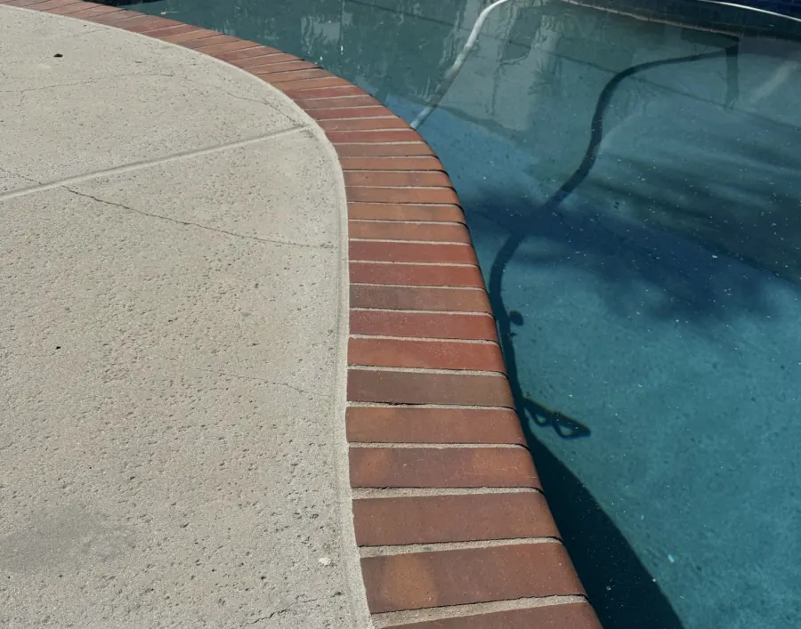 Repaired and refinished pool deck seal in Huntington Beach, CA