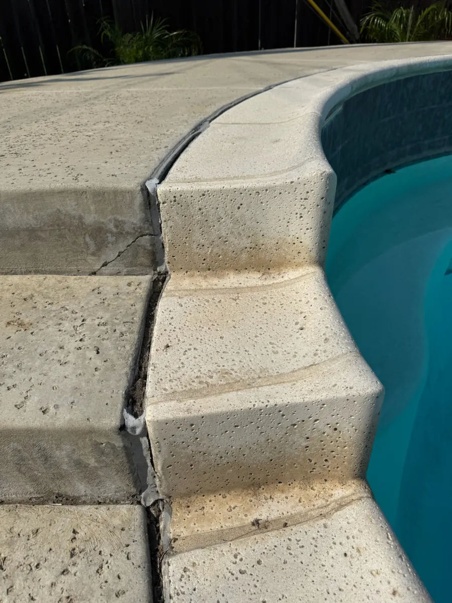 Worn pool deck surface before refinishing in Newport Coast, Orange County, CA